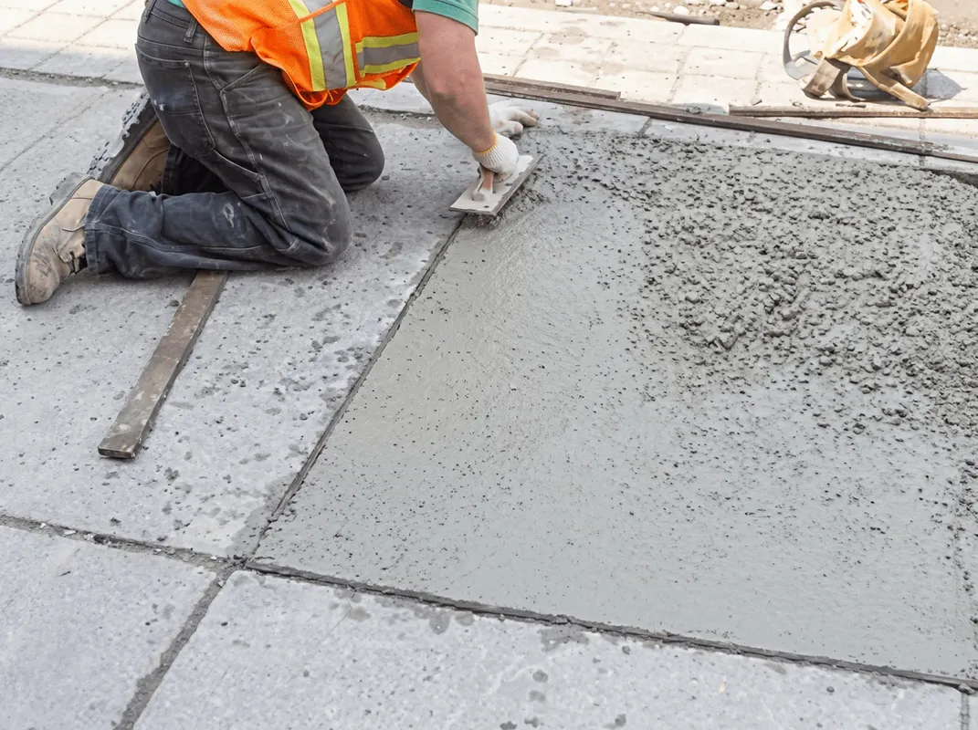 Professional repairing a concrete floor in Miami, FL
